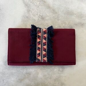 Elegant Burgundy Clutch with Fringe Detail
